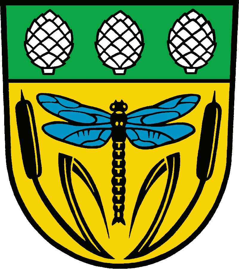Unter grünem Schildhaupt, darin drei silberne Kienäpfel balkenweise, in Gold eine schwarze Libelle mit blauen Flügeln, nach der Figur begleitet von zwei schwarzen Rohrkolben mit abgeknickten Blättern.