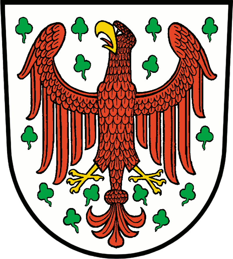 Wappen: In Silber, bestreut mit 14 grünen Kleeblättern, ein goldbewehrter roter Adler.<br>