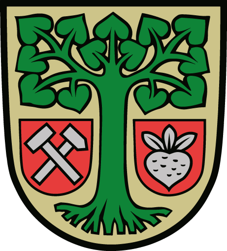 In Gold eine bewurzelte grüne Linde, begleitet von zwei roten Schilden, darin vorn gekreuzte Schlägel und Hammer, hinten eine beblättere silberne Rübe.</br>